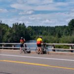 Riders on bridge